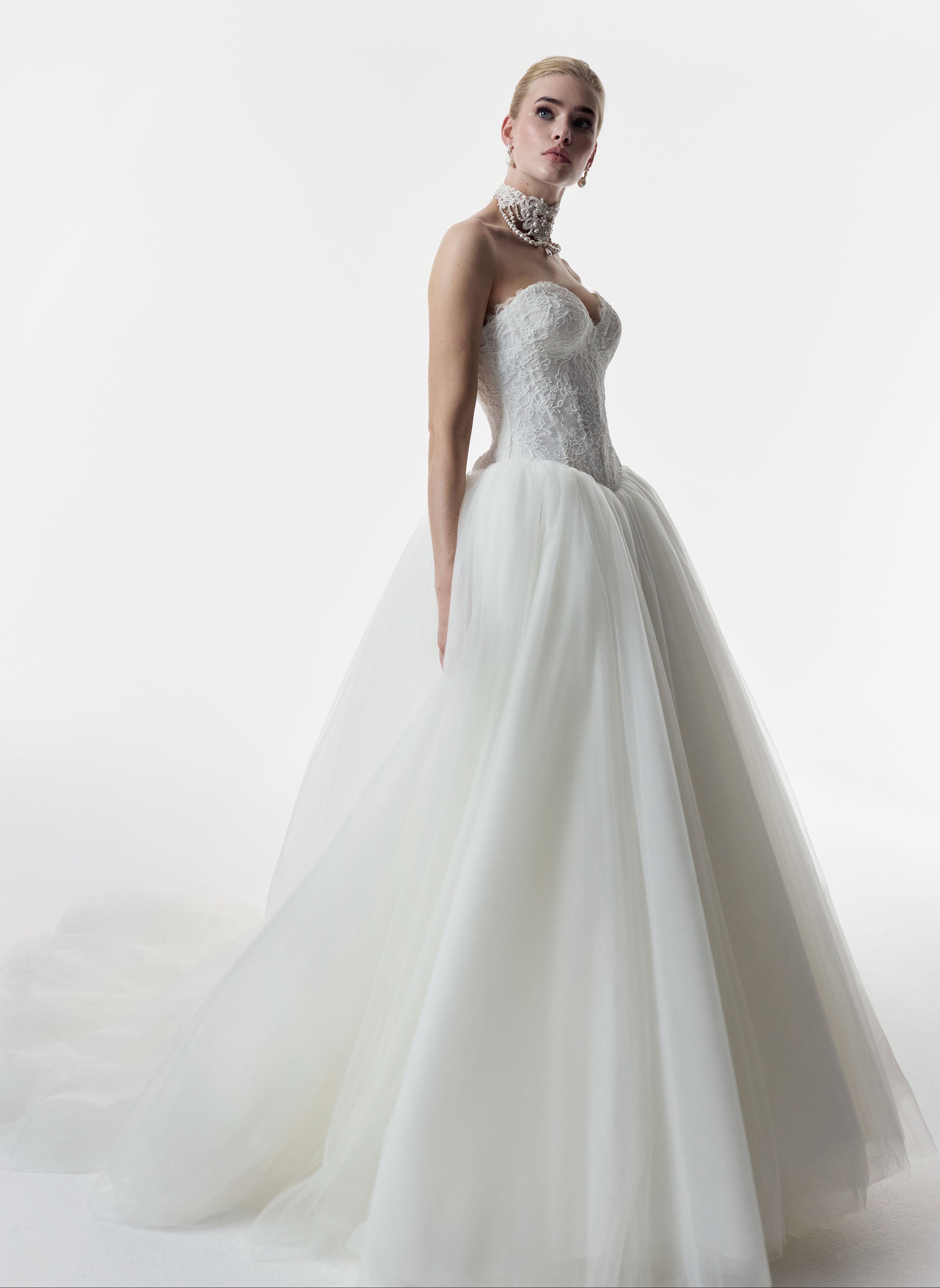 strapless sweetheart neckline corset basque waist bodice in corded French lace and full ballgown skirt in soft tulle
with choker