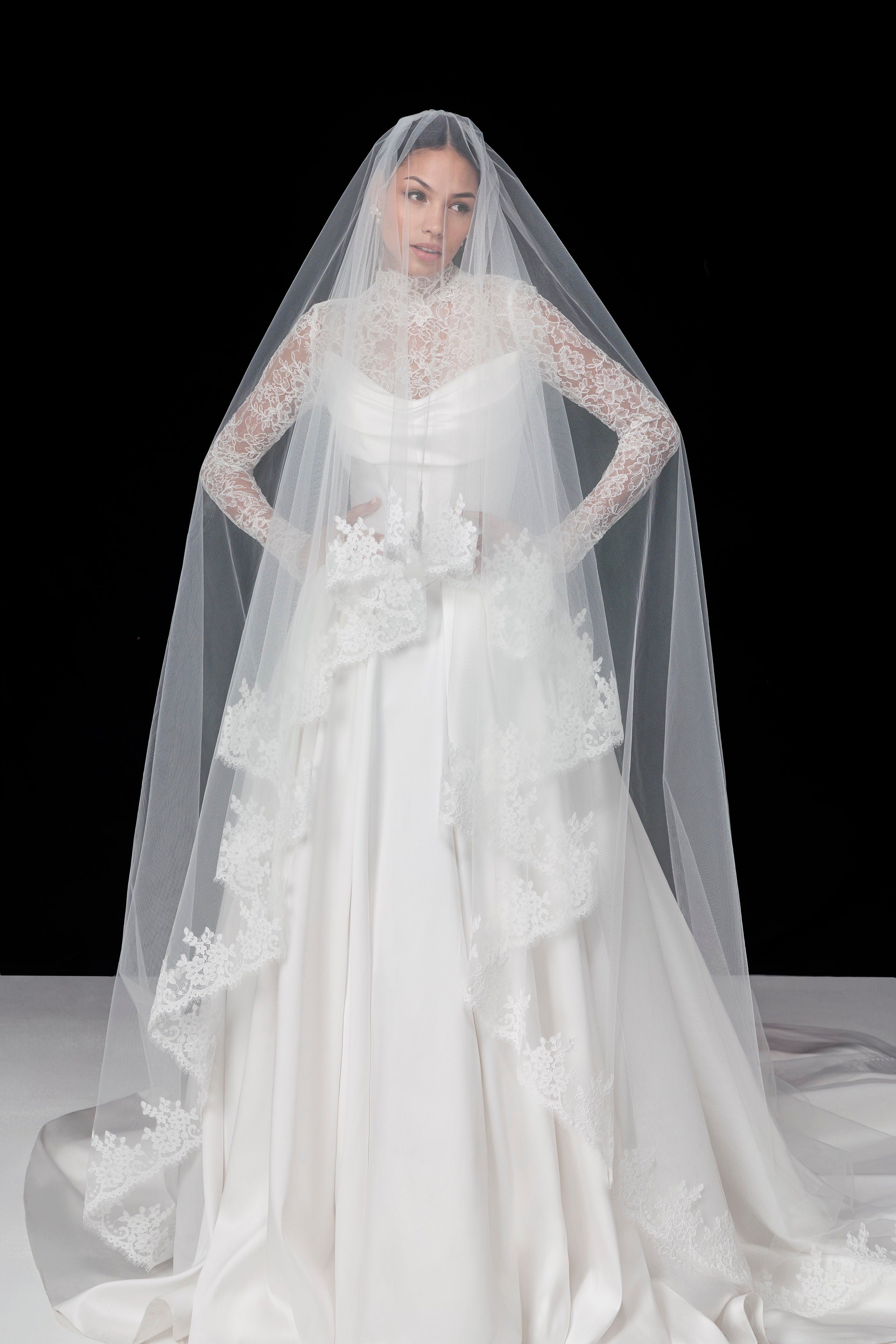 silk Mikado swoop neckline with a basque waist and pleated skirt