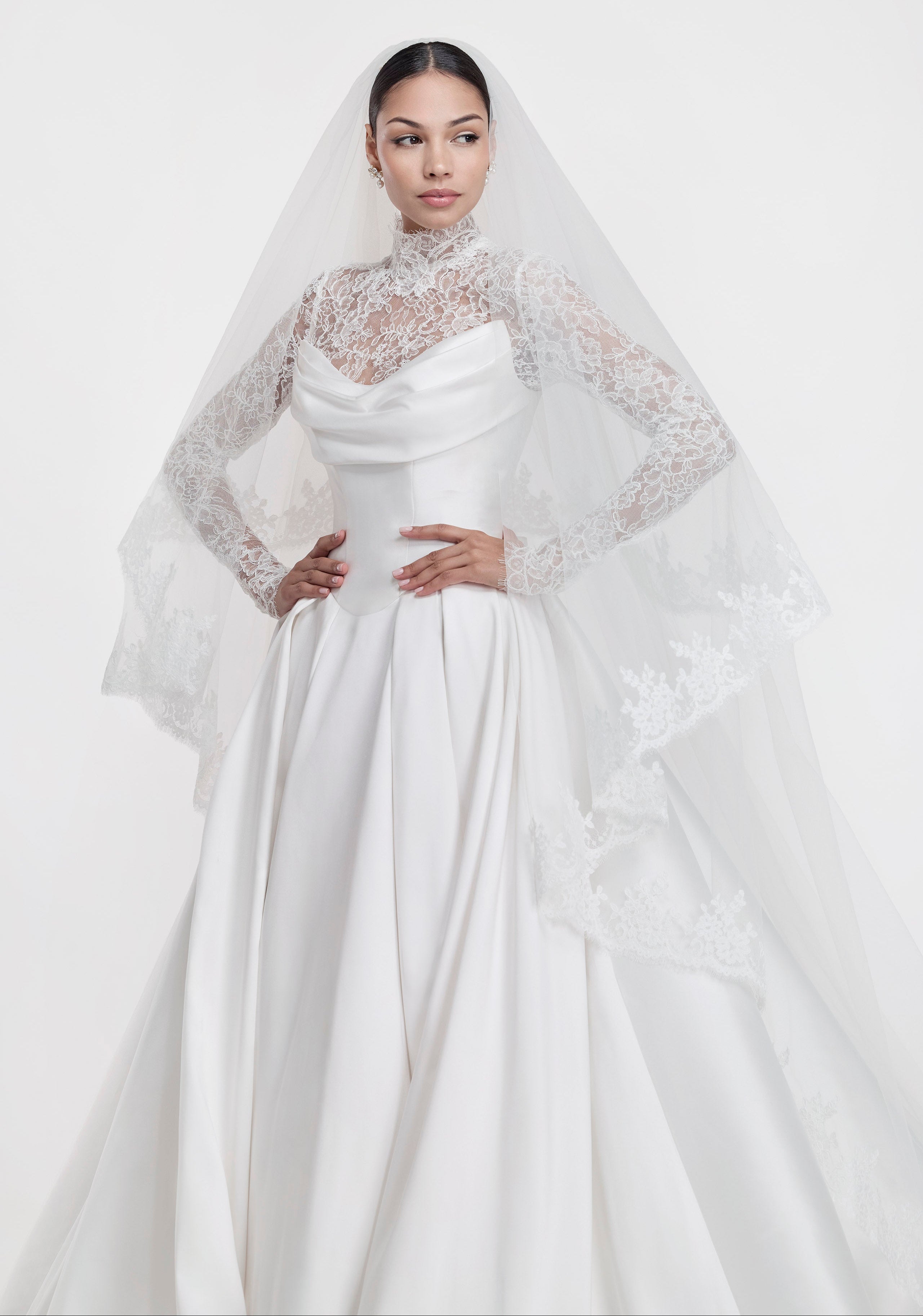 silk Mikado swoop neckline with a basque waist and pleated skirt