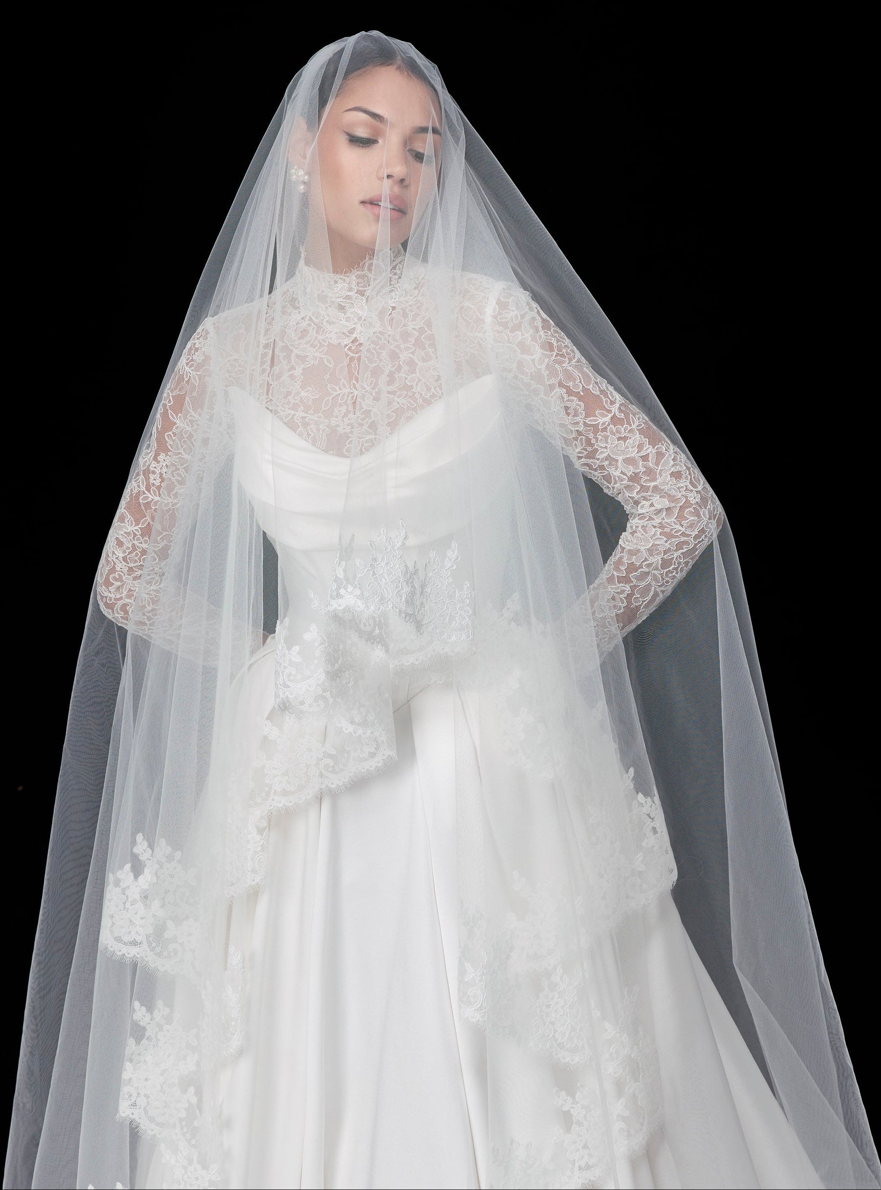 silk Mikado swoop neckline with a basque waist and pleated skirt