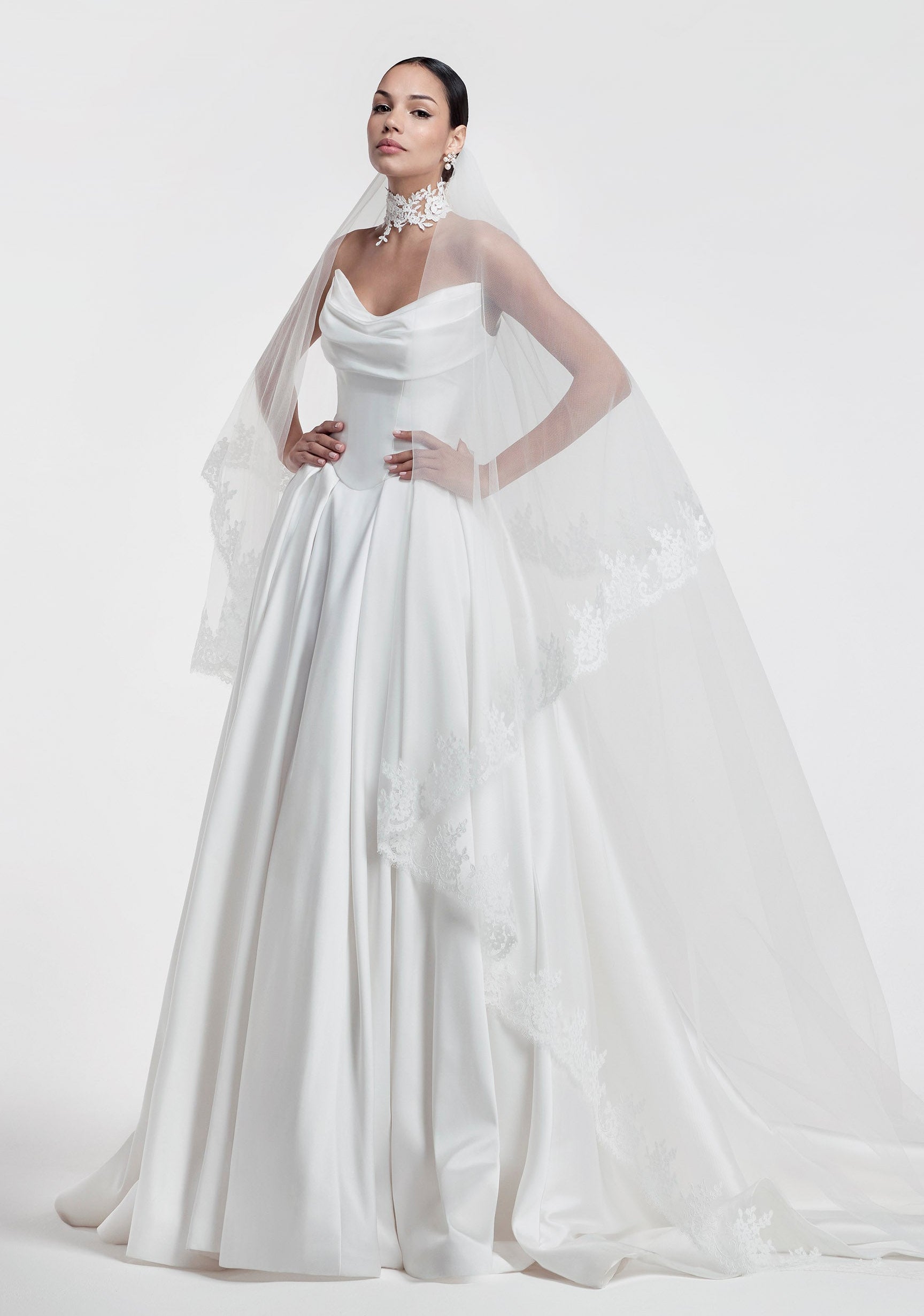 silk Mikado swoop neckline with a basque waist and pleated skirt